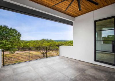 south austin custom home - exterior balcony